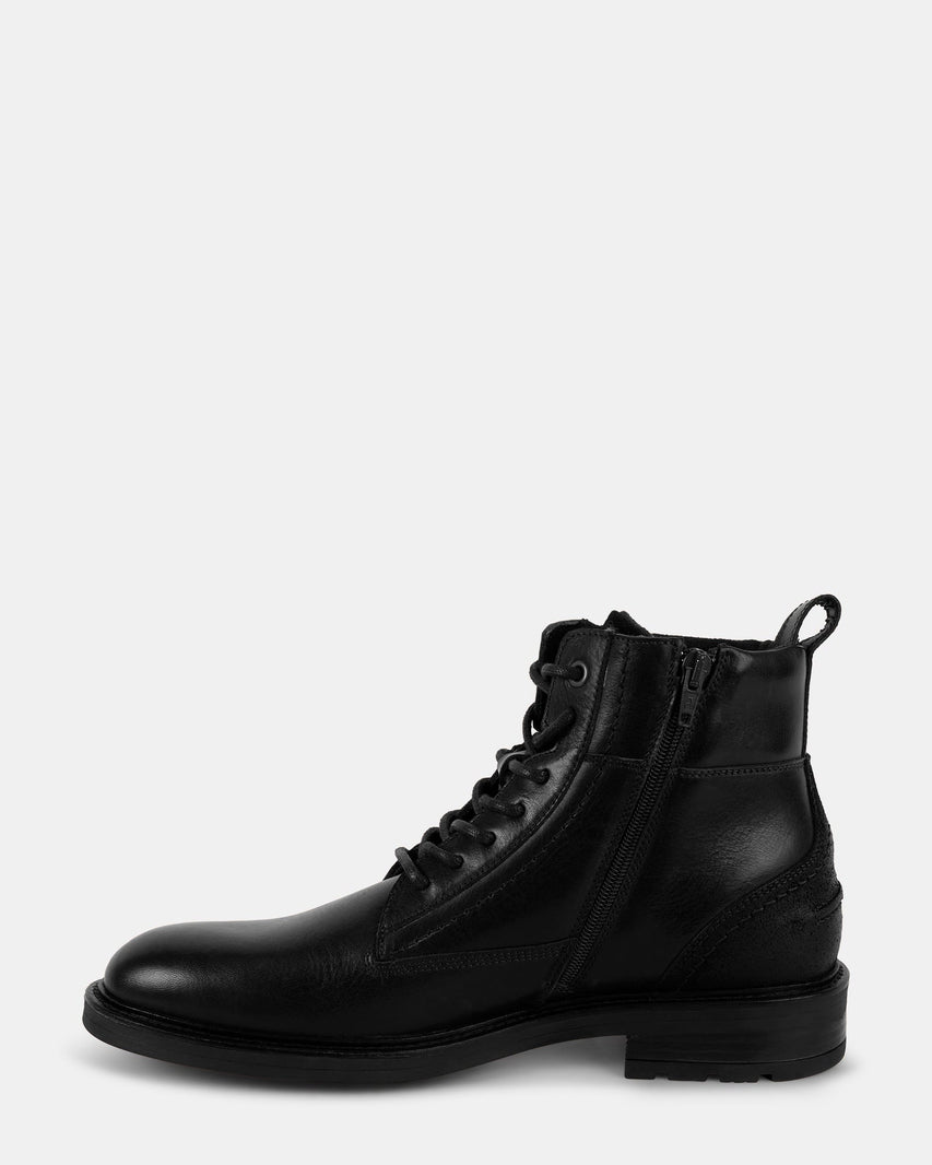 UNCANNY BLACK LEATHER - Men's Shoes - Steve Madden Canada